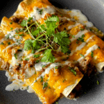 Southern Breakfast Enchiladas with Sausage Gravy