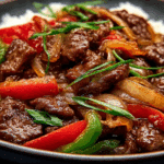 Sizzling Chinese Pepper Steak with Onions