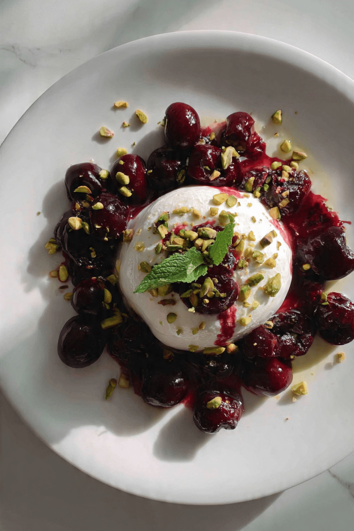 Burrata with Crushed Cherries and Pistachio